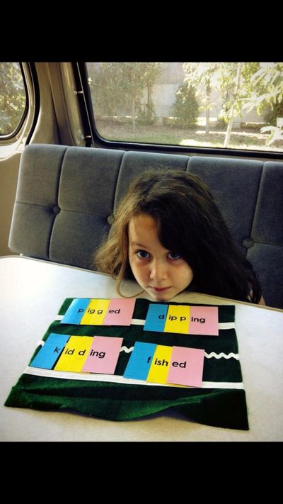 Child in the Roaming Reader van